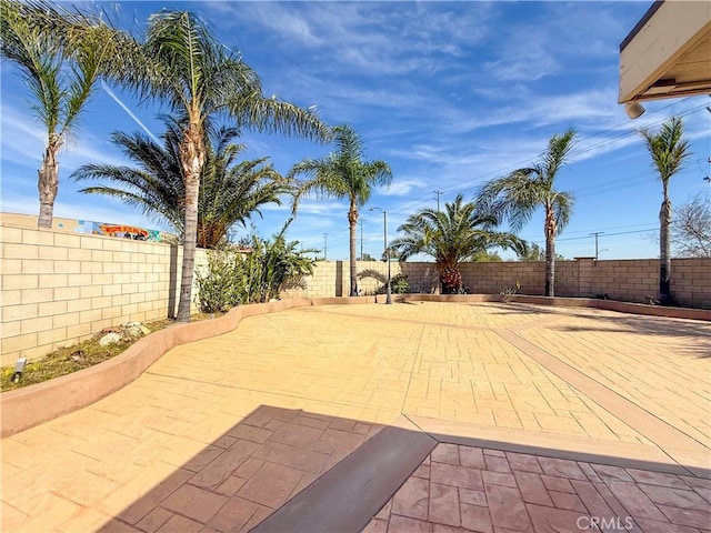 view of patio with a fenced backyard