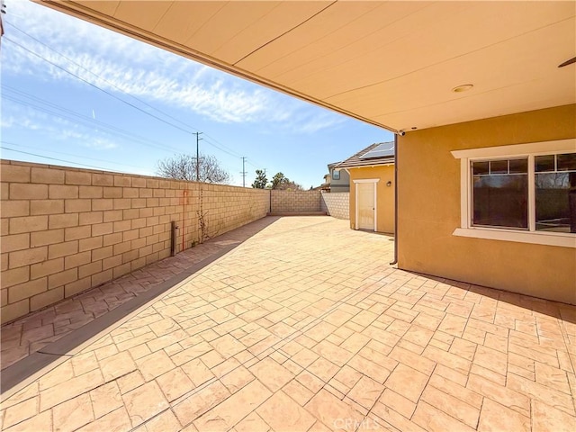 view of patio featuring a fenced backyard