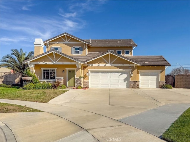 craftsman-style house featuring driveway, a gate, stone siding, stucco siding, and a garage