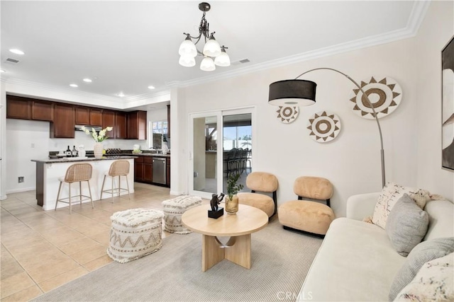 living room featuring light tile patterned flooring, an inviting chandelier, recessed lighting, and crown molding