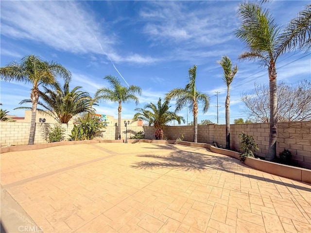 view of patio featuring a fenced backyard