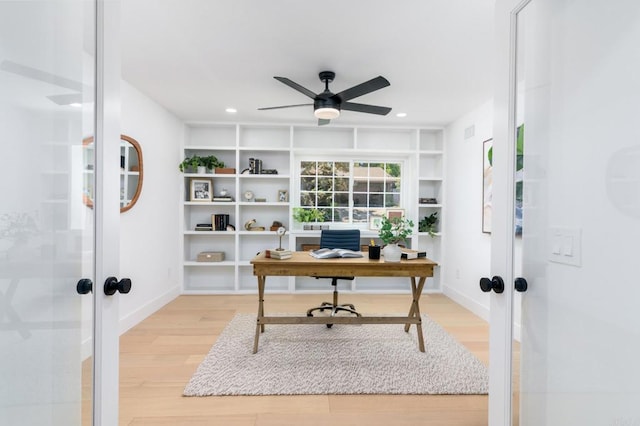 office with light wood-style floors, a ceiling fan, french doors, and recessed lighting