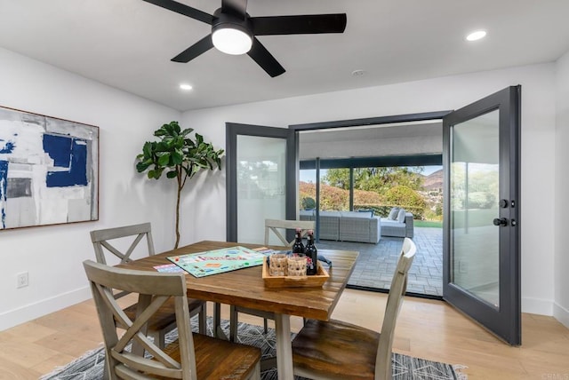dining area featuring recessed lighting, baseboards, ceiling fan, and light wood finished floors