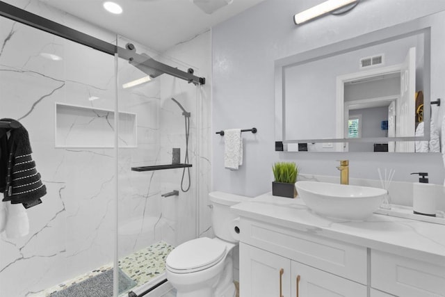 7162 Beagle St, San Diego, CA 92111 - full bath with a marble finish shower, toilet, and vanity