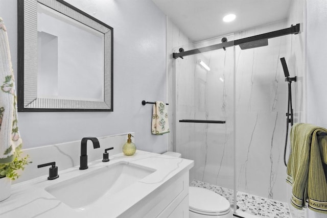 7162 Beagle St, San Diego, CA 92111 - bathroom featuring toilet, a marble finish shower, vanity, and recessed lighting