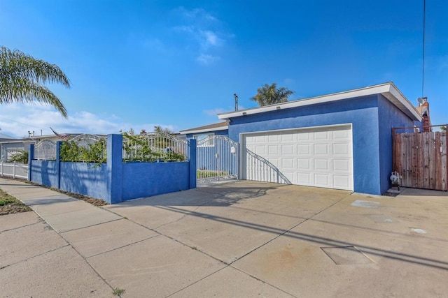 7162 Beagle St, San Diego, CA 92111 - garage with a gate and driveway