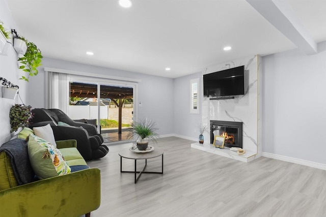7162 Beagle St, San Diego, CA 92111 - living area featuring wood finished floors, a fireplace, recessed lighting, and baseboards