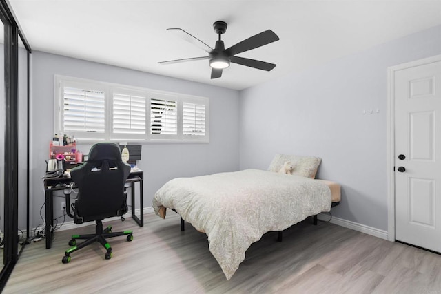 7162 Beagle St, San Diego, CA 92111 - bedroom with wood finished floors, baseboards, a ceiling fan, and an office area