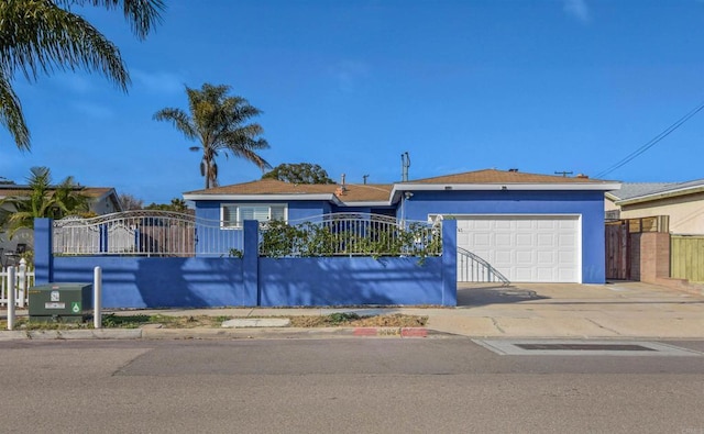 7162 Beagle St, San Diego, CA 92111 - single story home featuring driveway, a fenced front yard, an attached garage, and stucco siding