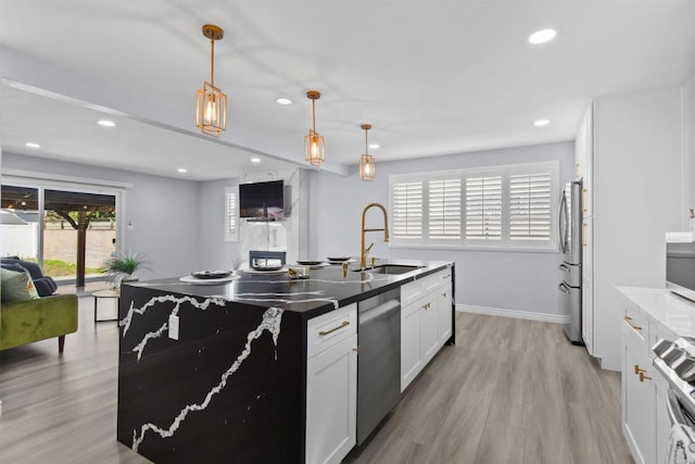 7162 Beagle St, San Diego, CA 92111 - kitchen featuring a sink, stainless steel appliances, recessed lighting, light wood-style floors, and open floor plan