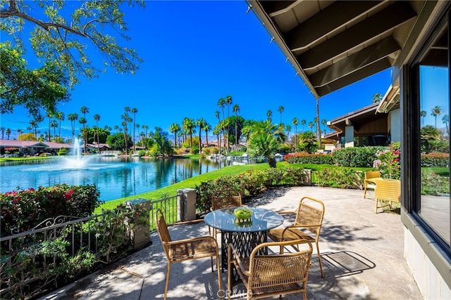 view of patio featuring a water view