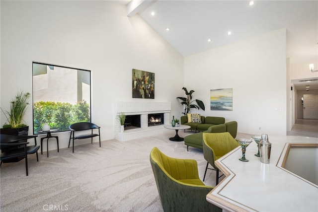 carpeted living room featuring recessed lighting, beam ceiling, high vaulted ceiling, and a fireplace