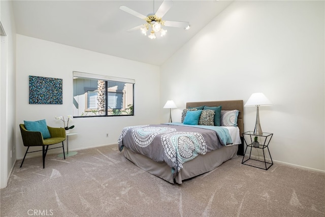 carpeted bedroom featuring high vaulted ceiling, a ceiling fan, and baseboards