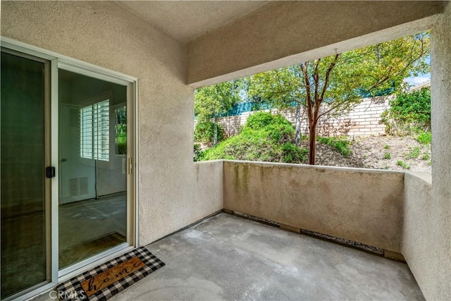 balcony with visible vents and a patio area