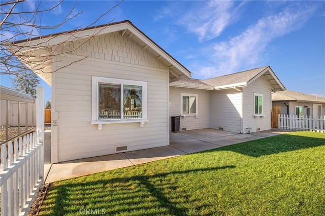 766 Willow St, Paradise, CA 95969 - back of property with a patio area, fence, crawl space, a yard, and central AC unit