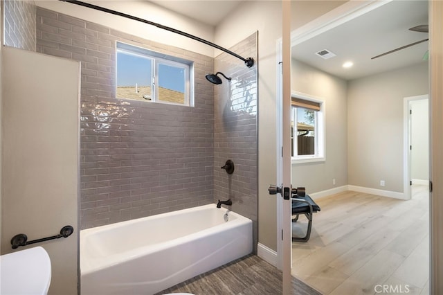 766 Willow St, Paradise, CA 95969 - full bath with toilet, baseboards, wood finished floors, and shower / bathing tub combination