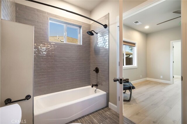 766 Willow St, Paradise, CA 95969 - full bath with wood finished floors, shower / tub combination, and ceiling fan