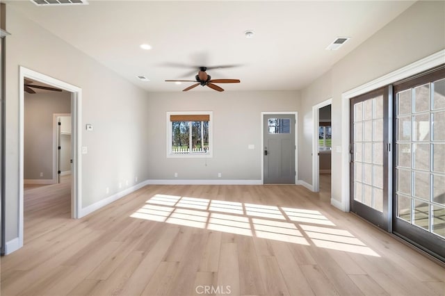 766 Willow St, Paradise, CA 95969 - unfurnished living room featuring a ceiling fan, baseboards, light wood finished floors, and visible vents