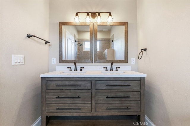 766 Willow St, Paradise, CA 95969 - full bath featuring double vanity, baseboards, and a shower