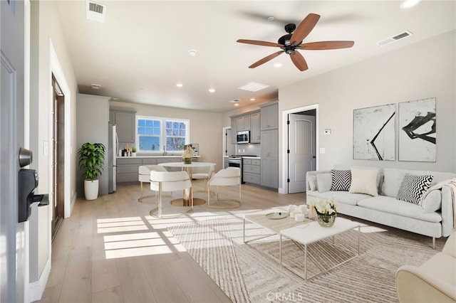 766 Willow St, Paradise, CA 95969 - living area with light wood-style flooring, ceiling fan, and recessed lighting