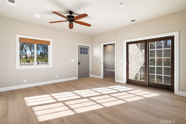 766 Willow St, Paradise, CA 95969 - unfurnished living room with visible vents, baseboards, and a ceiling fan