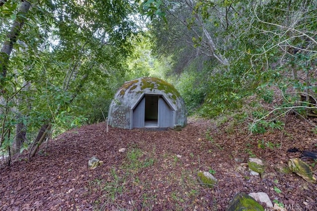 3399 Upper Lopez Canyon Rd, Arroyo Grande, CA 93420 - entry to storm shelter with an outbuilding and a storage shed