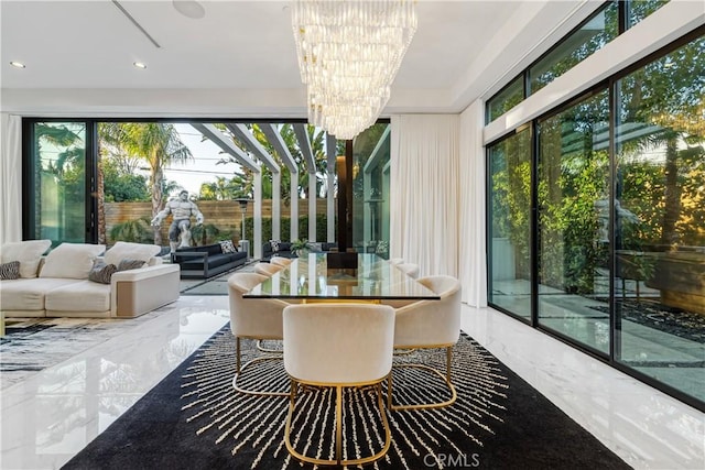 sunroom with an inviting chandelier