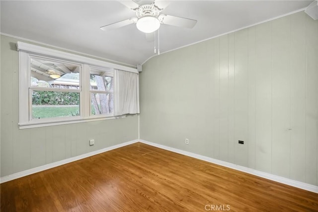 4254 Miramonte Pl, Riverside, CA 92501 - spare room featuring wood finished floors, ceiling fan, baseboards, and ornamental molding