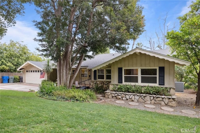 4254 Miramonte Pl, Riverside, CA 92501 - ranch-style house featuring a front yard, cooling unit, board and batten siding, driveway, and roof with shingles