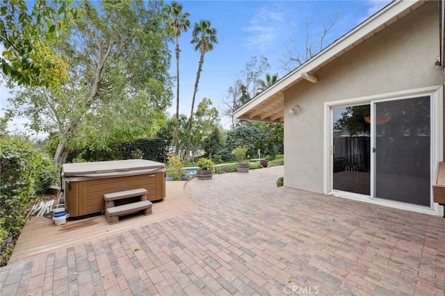 4254 Miramonte Pl, Riverside, CA 92501 - view of patio / terrace with a hot tub and a wooden deck