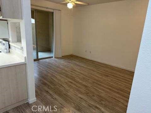 375 Central Ave Unit 12, Riverside, CA 92507 - unfurnished room with ceiling fan and wood finished floors