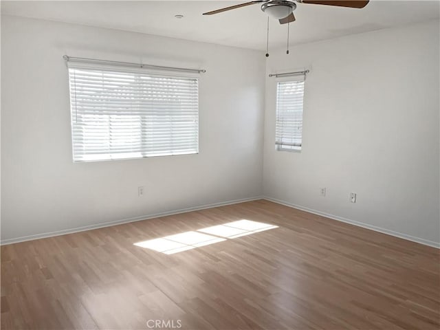 15605 Lasselle St Unit 6, Moreno Valley, CA 92551 - empty room featuring ceiling fan, wood finished floors, and baseboards