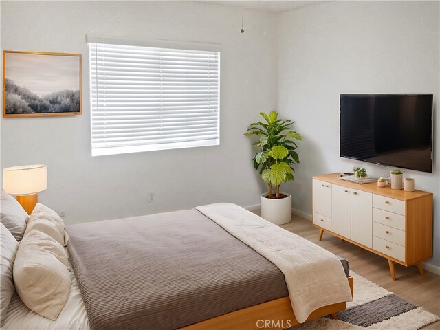 15605 Lasselle St Unit 6, Moreno Valley, CA 92551 - bedroom with light wood-type flooring