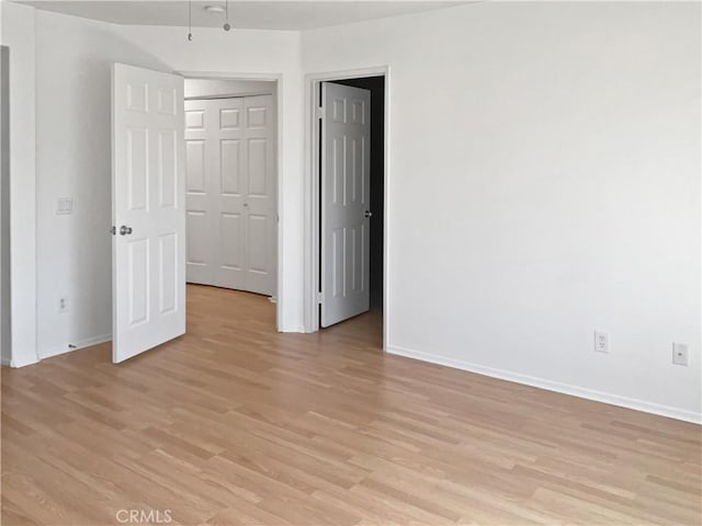 15605 Lasselle St Unit 6, Moreno Valley, CA 92551 - empty room featuring light wood-style floors and baseboards