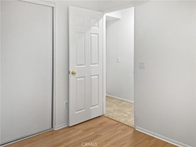 15605 Lasselle St Unit 6, Moreno Valley, CA 92551 - empty room with light wood-style flooring and baseboards