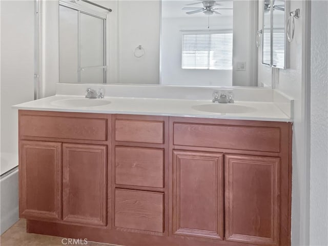 15605 Lasselle St Unit 6, Moreno Valley, CA 92551 - full bathroom with double vanity, a ceiling fan, and a shower