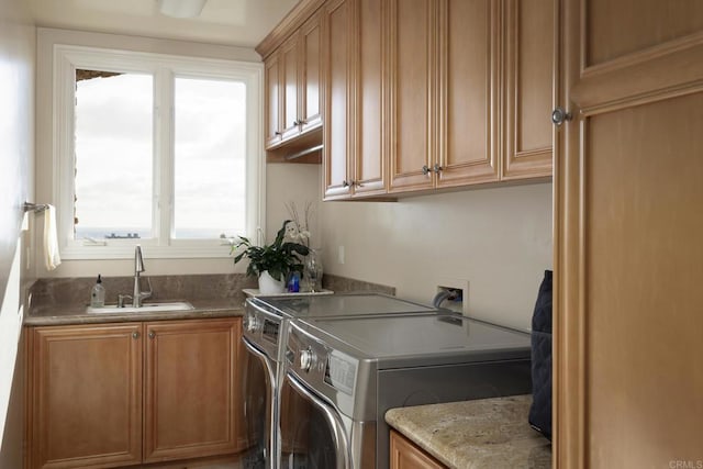 5023 Windsor Dr, San Diego, CA 92109 - laundry room with cabinet space, healthy amount of natural light, and independent washer and dryer