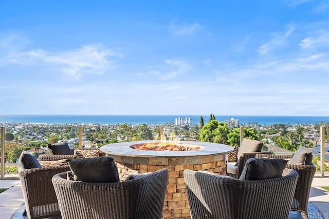 5023 Windsor Dr, San Diego, CA 92109 - view of patio with an outdoor fire pit and a water view