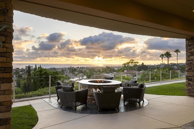5023 Windsor Dr, San Diego, CA 92109 - patio terrace at dusk with a fire pit and a patio area