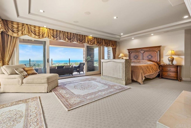 5023 Windsor Dr, San Diego, CA 92109 - carpeted bedroom featuring a tray ceiling, access to outside, recessed lighting, and a water view