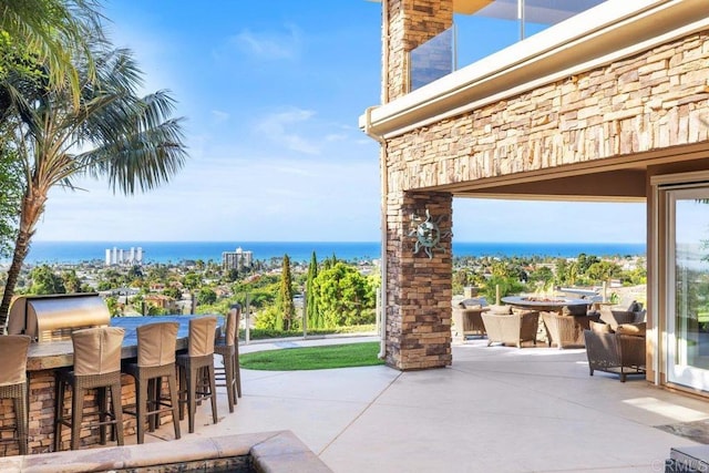 5023 Windsor Dr, San Diego, CA 92109 - view of patio featuring an outdoor fire pit and a water view