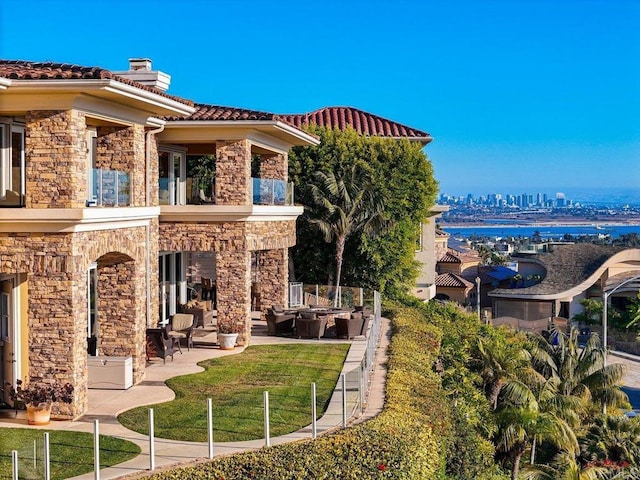 5023 Windsor Dr, San Diego, CA 92109 - view of community featuring an outdoor hangout area, a patio area, and a lawn