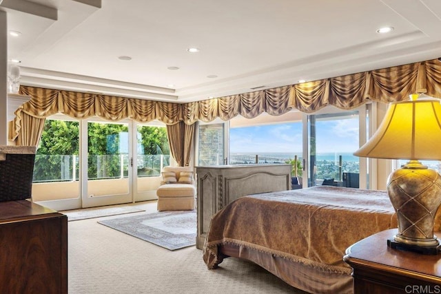 5023 Windsor Dr, San Diego, CA 92109 - carpeted bedroom featuring multiple windows, access to exterior, a tray ceiling, and recessed lighting