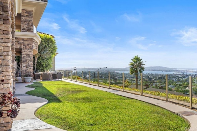 5023 Windsor Dr, San Diego, CA 92109 - view of grassy yard with an outdoor living space and a mountain view