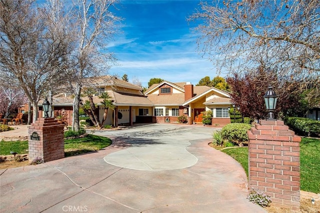 41504 Mission Dr, Palmdale, CA 93551 - view of front of home featuring curved driveway