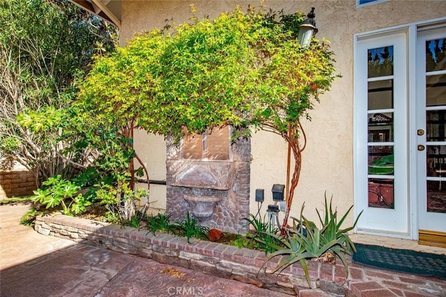 41504 Mission Dr, Palmdale, CA 93551 - entrance to property featuring stucco siding and french doors