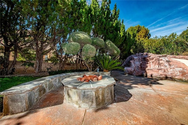 41504 Mission Dr, Palmdale, CA 93551 - view of patio featuring a fire pit