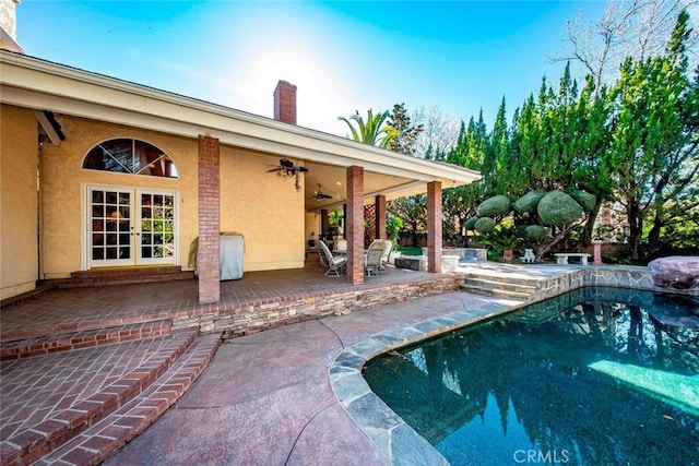 41504 Mission Dr, Palmdale, CA 93551 - swimming pool featuring a patio area and ceiling fan