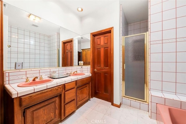 41504 Mission Dr, Palmdale, CA 93551 - bathroom with a shower stall, double vanity, a tub to relax in, and tile walls