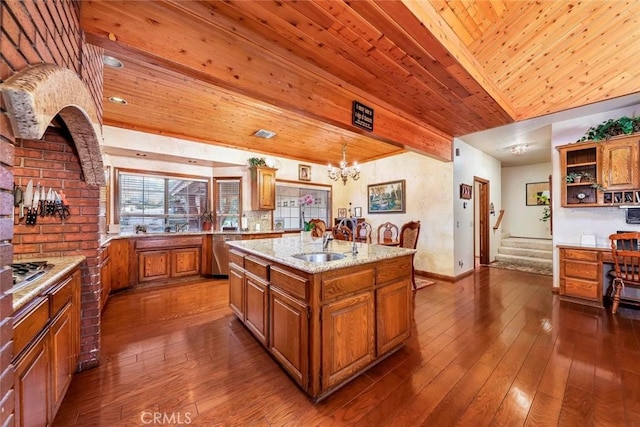 41504 Mission Dr, Palmdale, CA 93551 - kitchen with brown cabinetry, wood ceiling, a kitchen island with sink, dark wood-style flooring, and dishwasher